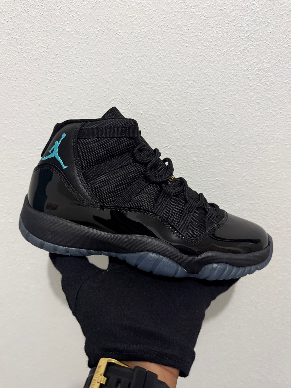 Jordan Retro 11 Gamma Blue Women’s High-Top Sneakers in Black with Teal Jumpman